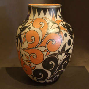Swirl flower and geometric design on a polychrome jar