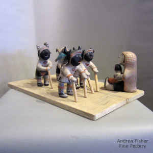 Polychrome deer dancer tableau