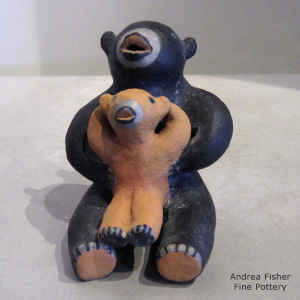 Bear storyteller with 1 cub