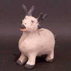 Obese deer figurine