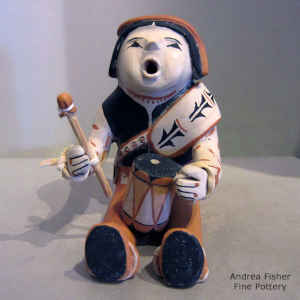 A singing drummer figure