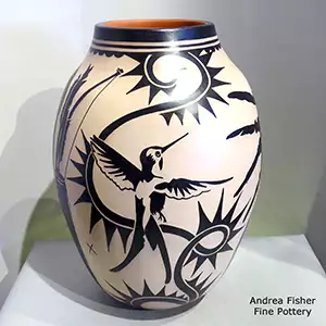 A bird, dancer and geometric design on a polychrome jar