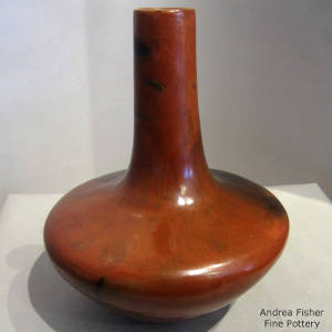 Fire clouds on a long neck red jar