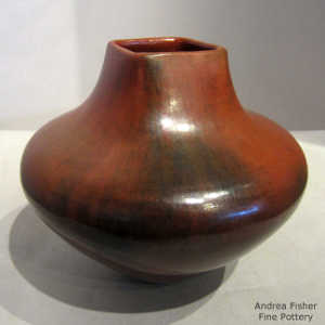 Square opening, fire clouds and pine pitch coating on a brown jar