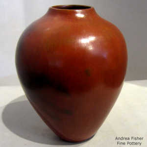 Fire clouds and pine pitch coating on a brown jar