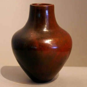 Fire clouds and pine pitch coating on a brown jar
