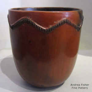 Fire clouds and pine pitch coating on a brown jar