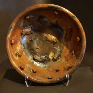 Horned toads in a brown bowl