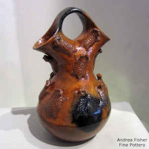 Horned toads, fire clouds and pine pitch on a brown wedding vase