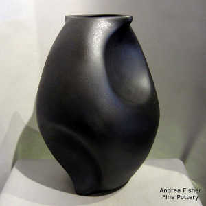 Micaceous black sculptural piece
