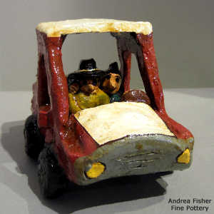 Dineh folk art: Dineh couple in a pickup