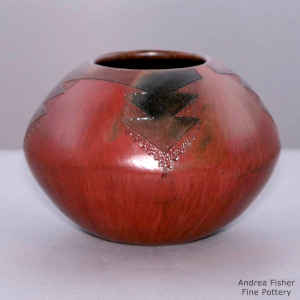 Brown jar with sgraffito Dineh carpet design, fire clouds and pine pitch coating