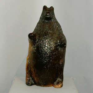Pine pitch coating on a large brown bear bank