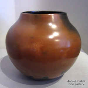 Fire clouds on a burnished brown jar
