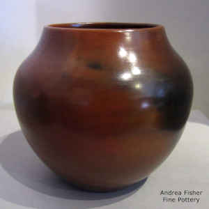 Fire clouds on a polished and burnished brown jar