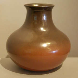 Plain, polished two-tone brown jar