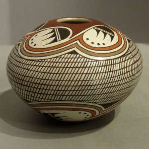 Bat wing and geometric design on a polychrome seedpot
