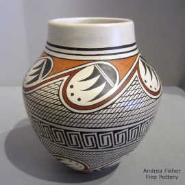 Polychrome jar with a stylized migration pattern design