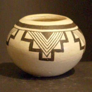 Cloud and rain design on a black and white bowl