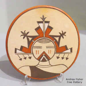 Katsina and geometric design on a round polychrome tile