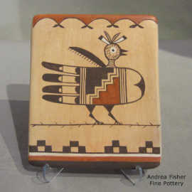 Bird, bird element and geometric design on a polychrome tile