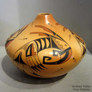 Shard, stylized bird element and geometric design on a polychrome yellow ware jar