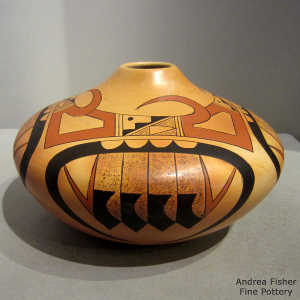 Fire clouds and a four direction eagletail. bird element and geometric design on a polychrome yellow ware jar
