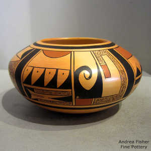 Four direction large shard and geometric design on a polychrome yellow ware bowl