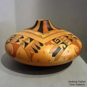 Bird element, dragonfly and geometric design on a polychrome yellow ware jar with fire clouds