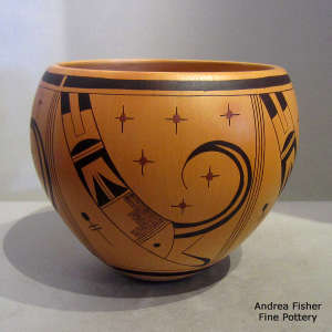 Bird element, dragonfly and geometric design on a deep polychrome bowl