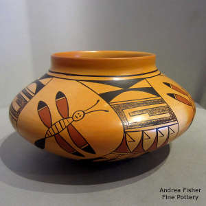 4-panel dragonfly and geometric design on a polychrome jar