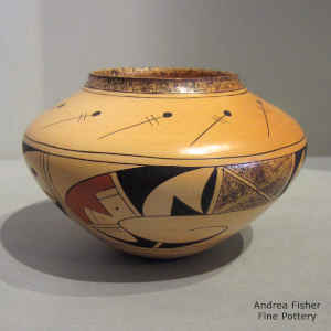 Bird element and geometric design on a polychrome jar with fire clouds