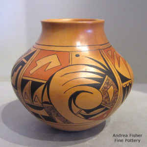 Bird element and geometric design on a polychrome jar with fire clouds