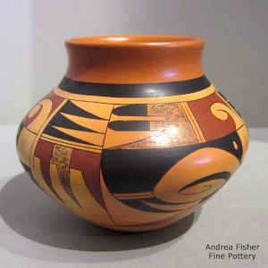Fire clouds, bird element and geometric design on a polychrome jar