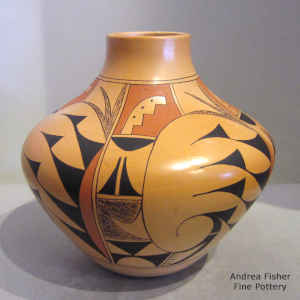 Fire clouds, bird element and geometric design on a polychrome jar