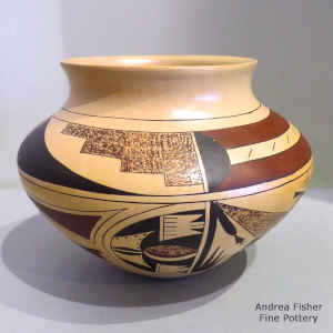 Bird element, geometric design and fire clouds on a polychrome jar