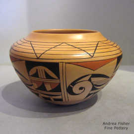 Bird element, geometric design and fire clouds on a polychrome jar