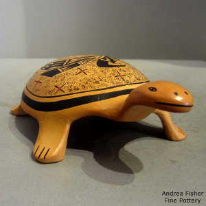 Bird element, shard and geometric design on a turtle figure