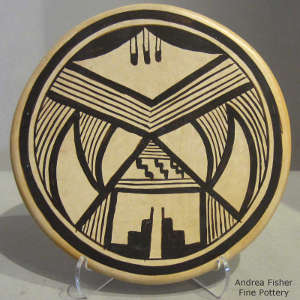 Geometric design on a black and white round tile
