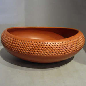 Corrugated band on a red bowl