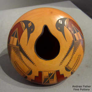 Bird element, kiva step and geometric design on a polychrome jar