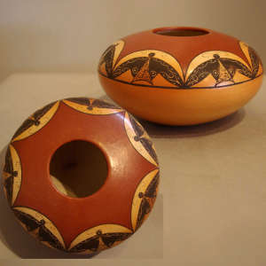 Awatovi star and moth design on a polychrome jar