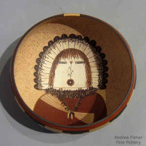 Corn Maiden design inside, kiva step geometric design outside on a speckled polychrome bowl