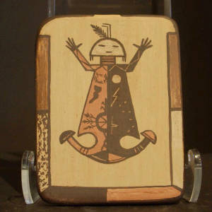 Yei design on a polychrome tile