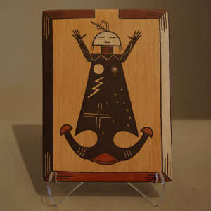 Father Sky figure and geometric designs on tile