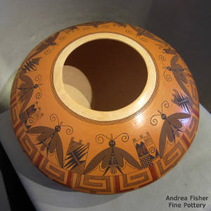 Moth and geometric design on a polychrome jar