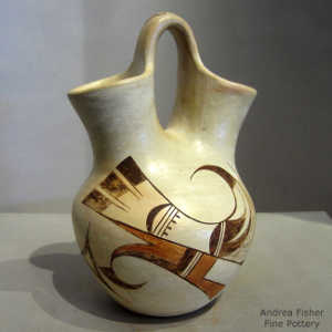 Bird element and geometric design on a polychrome wedding vase