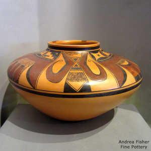 Asymmetric bird element, shard and geometric design on a Sikyatki-reproduction yellow ware jar