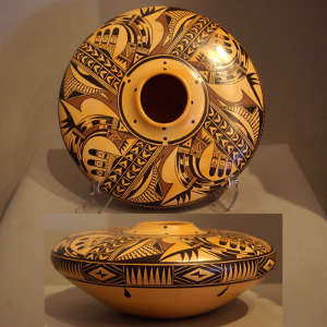 Bird element and waterfall design on a polychrome jar