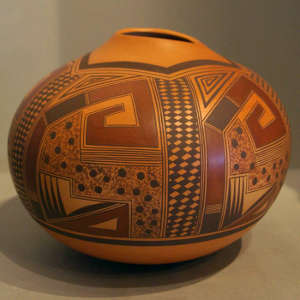 Geometric design and an organic opening on a polychrome jar